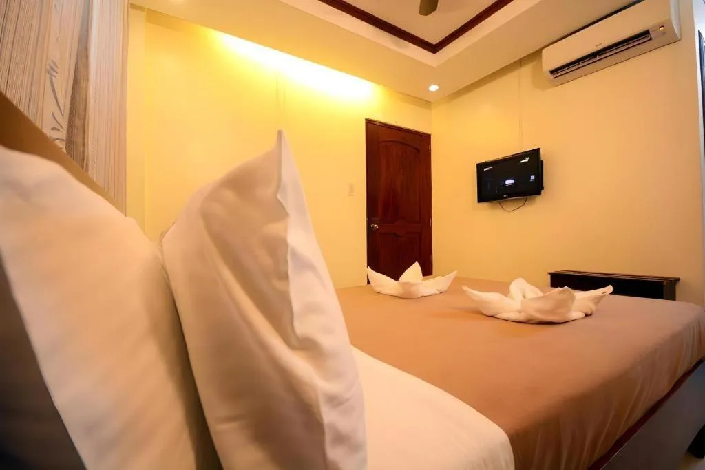 Bed in Ipil Suites El Nido