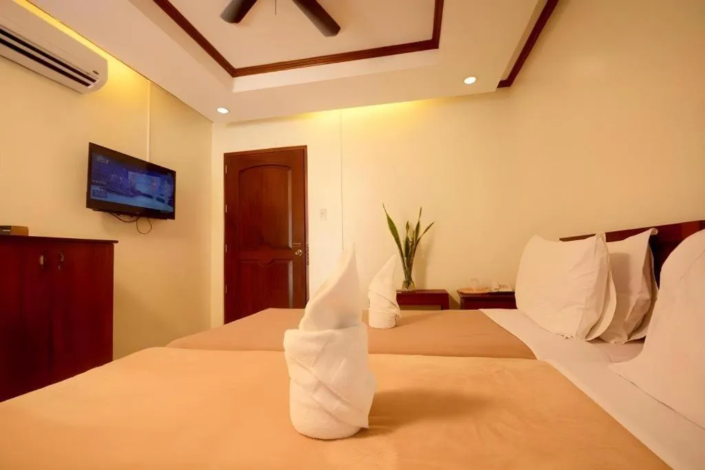 Bed in Ipil Suites El Nido