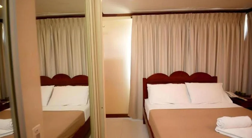 Bed in Ipil Suites El Nido