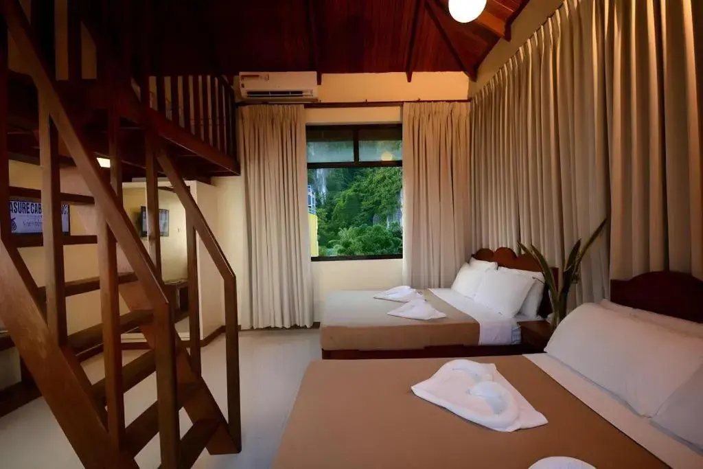 Bed in Ipil Suites El Nido Bed in Ipil Suites El Nido