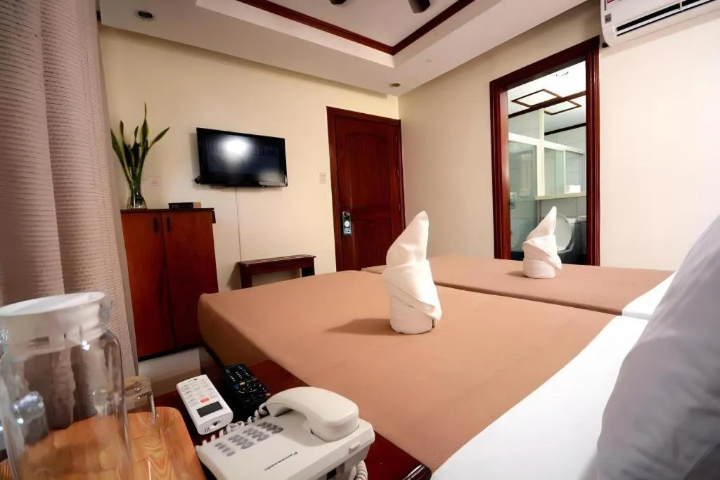 Bed in Ipil Suites El Nido