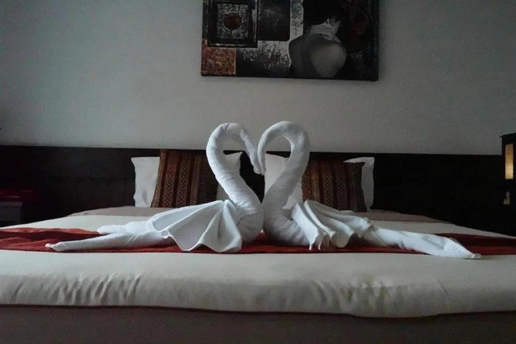 Bed in The Nice Patong Hotel