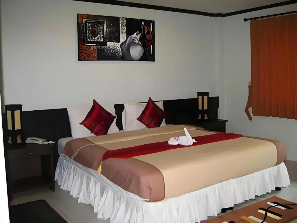 Bed in The Nice Patong Hotel Bed in The Nice Patong Hotel