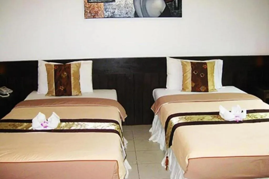 Bed in The Nice Patong Hotel