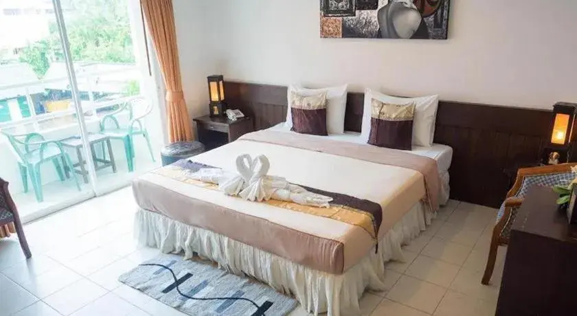 Bed in The Nice Patong Hotel Bed in The Nice Patong Hotel