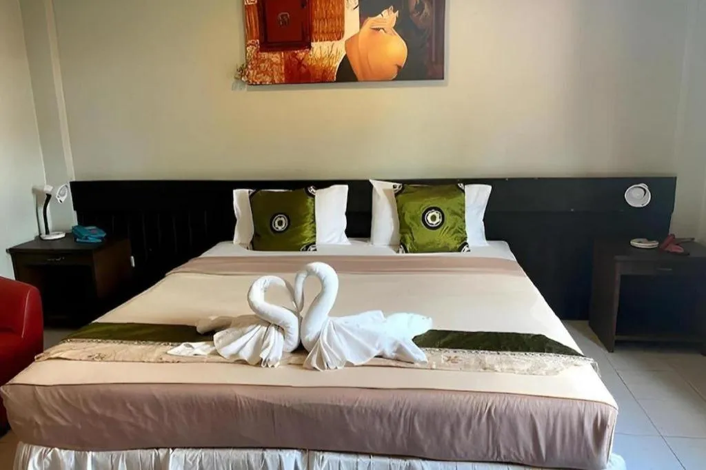 Bed in The Nice Patong Hotel
