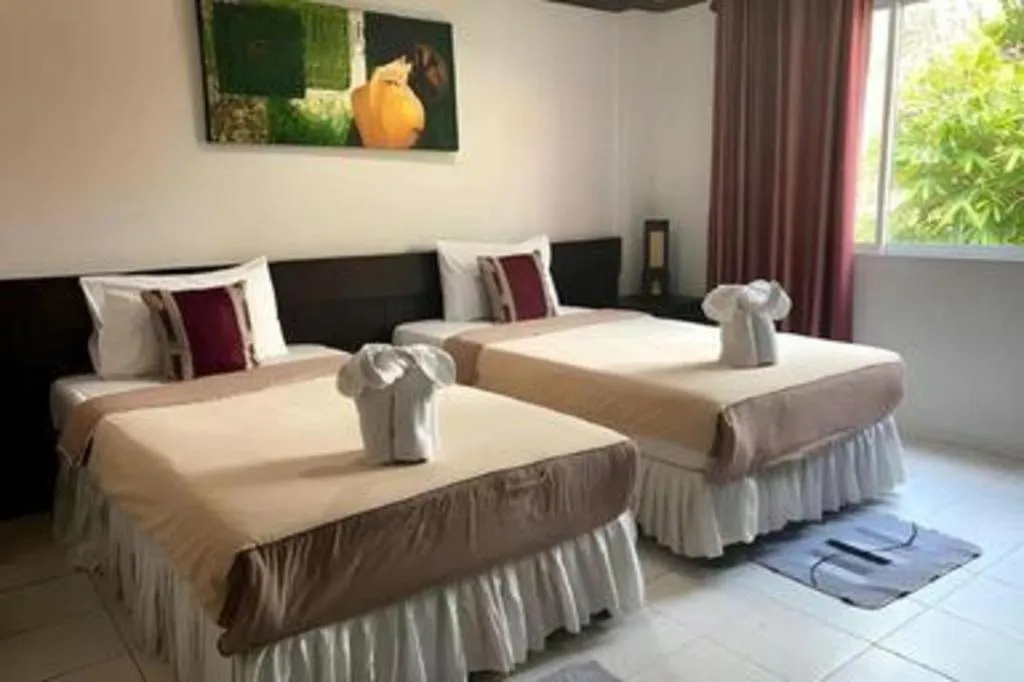 Bed in The Nice Patong Hotel