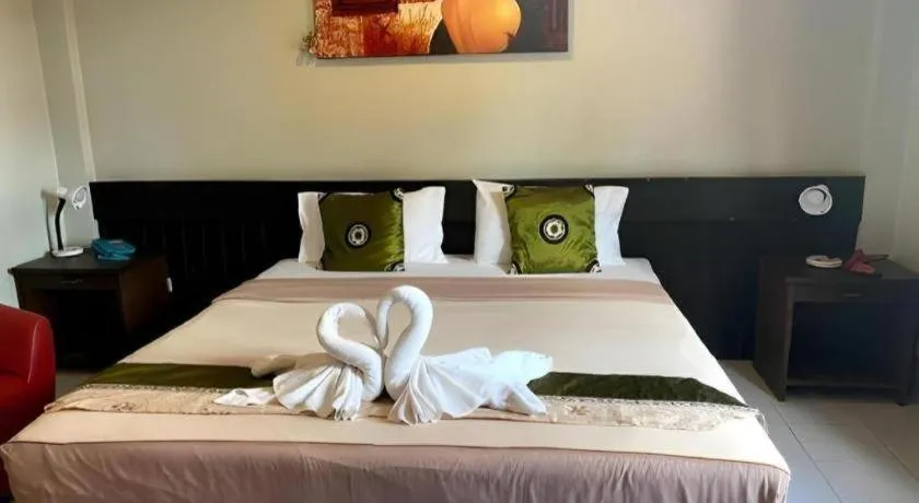 Bed in The Nice Patong Hotel