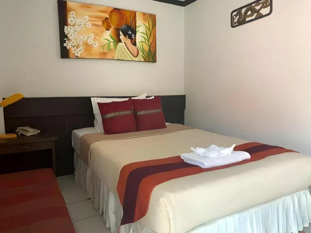 Bed in The Nice Patong Hotel Bed in The Nice Patong Hotel