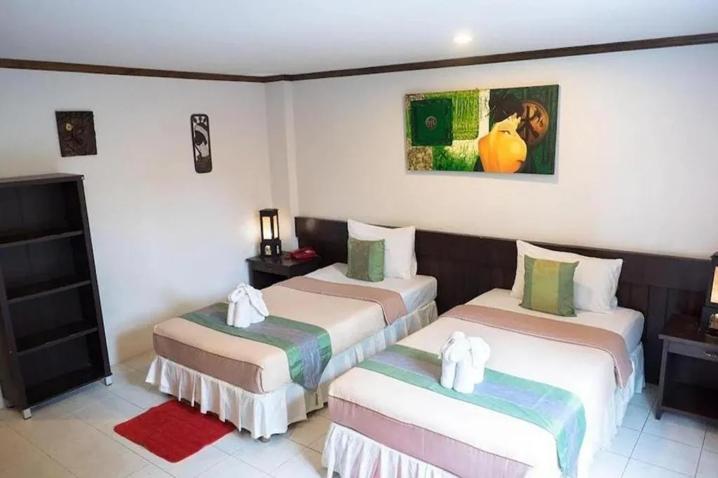 Bed in The Nice Patong Hotel