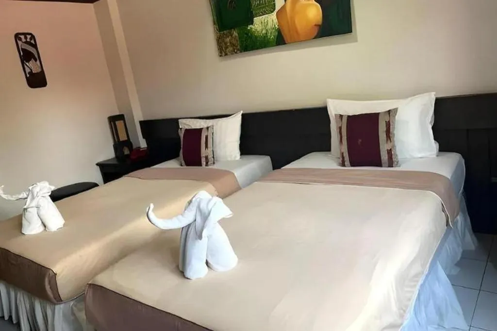 Bed in The Nice Patong Hotel