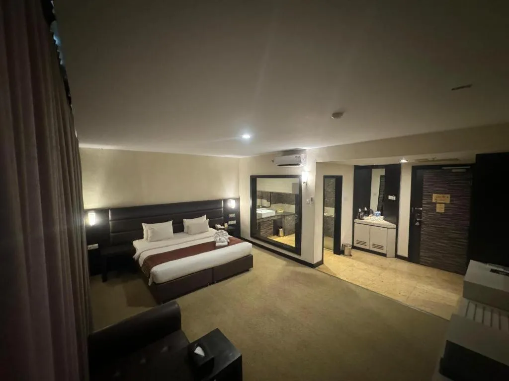 Bed in The BCC Hotel & Residence