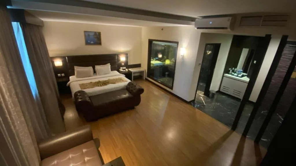 Bed in The BCC Hotel & Residence