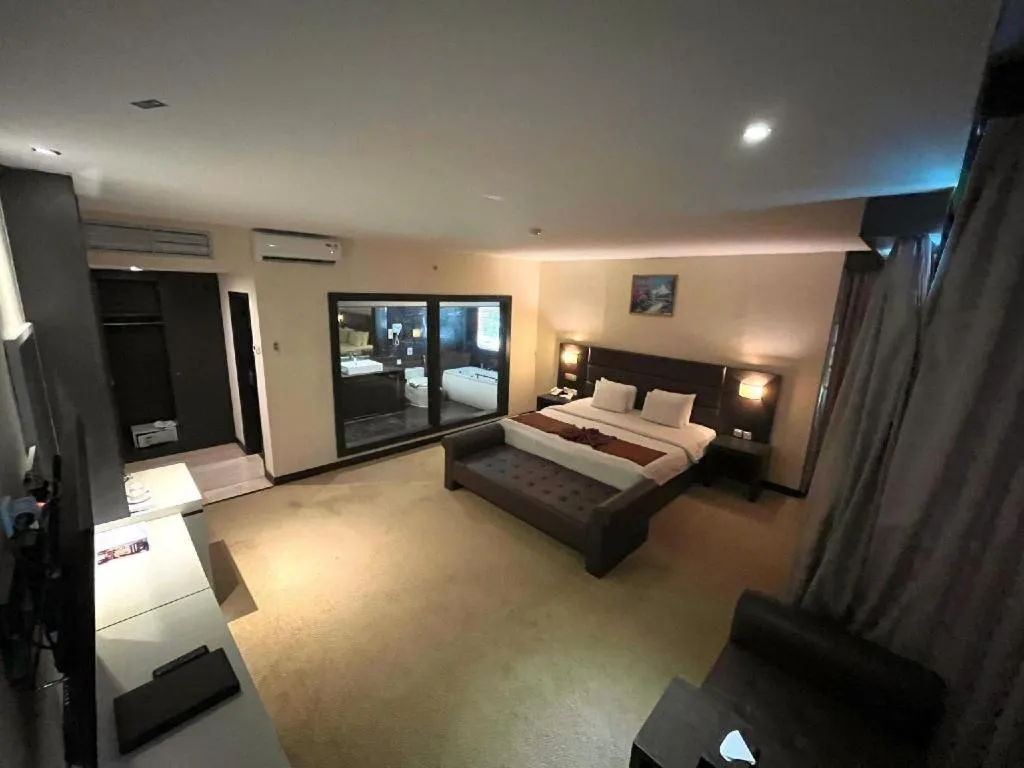 Bed in The BCC Hotel & Residence