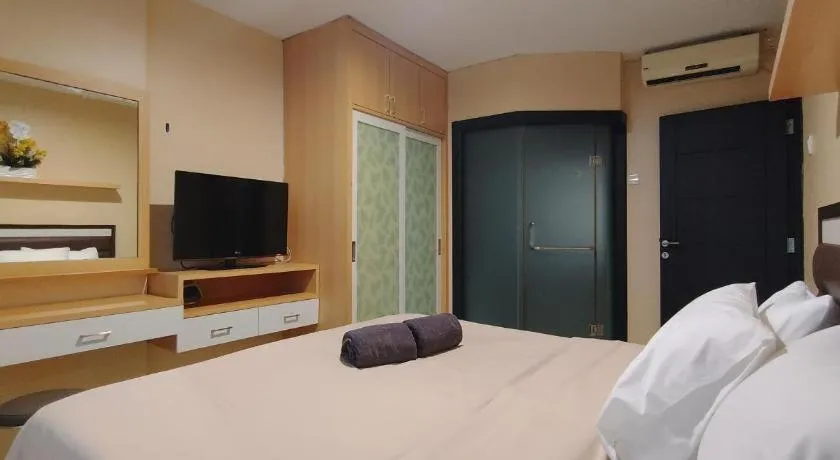 Bed in The BCC Hotel & Residence