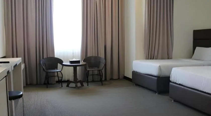 Bed in The BCC Hotel & Residence