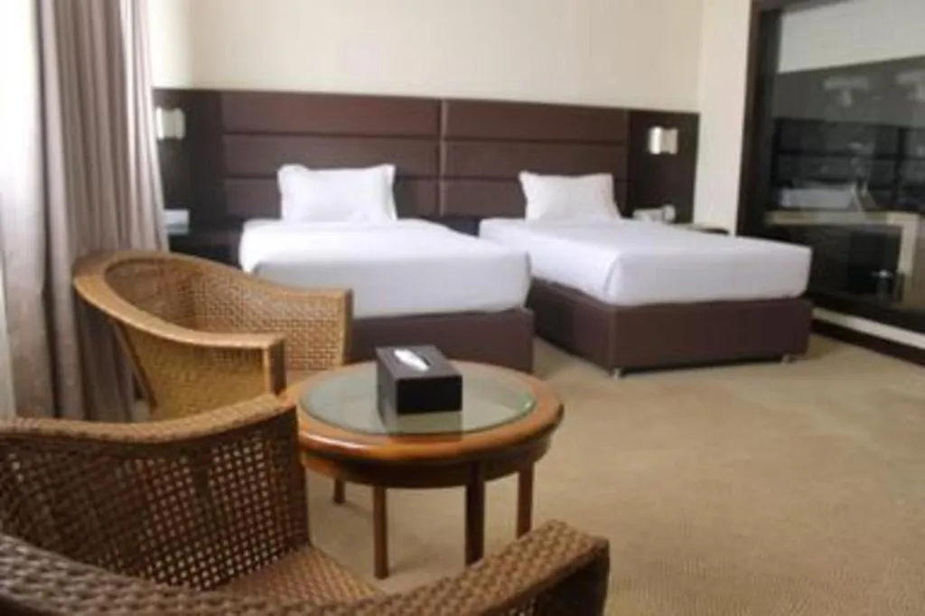 Bed in The BCC Hotel & Residence