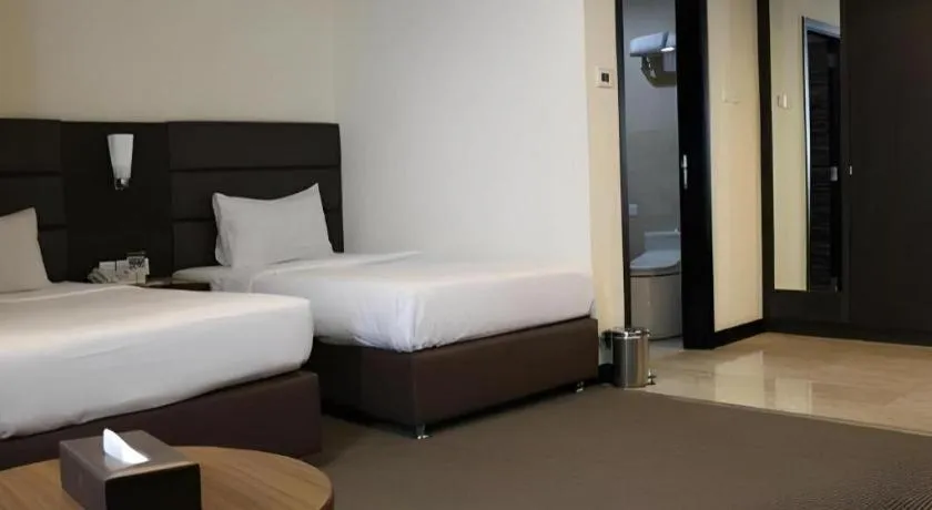 Bed in The BCC Hotel & Residence