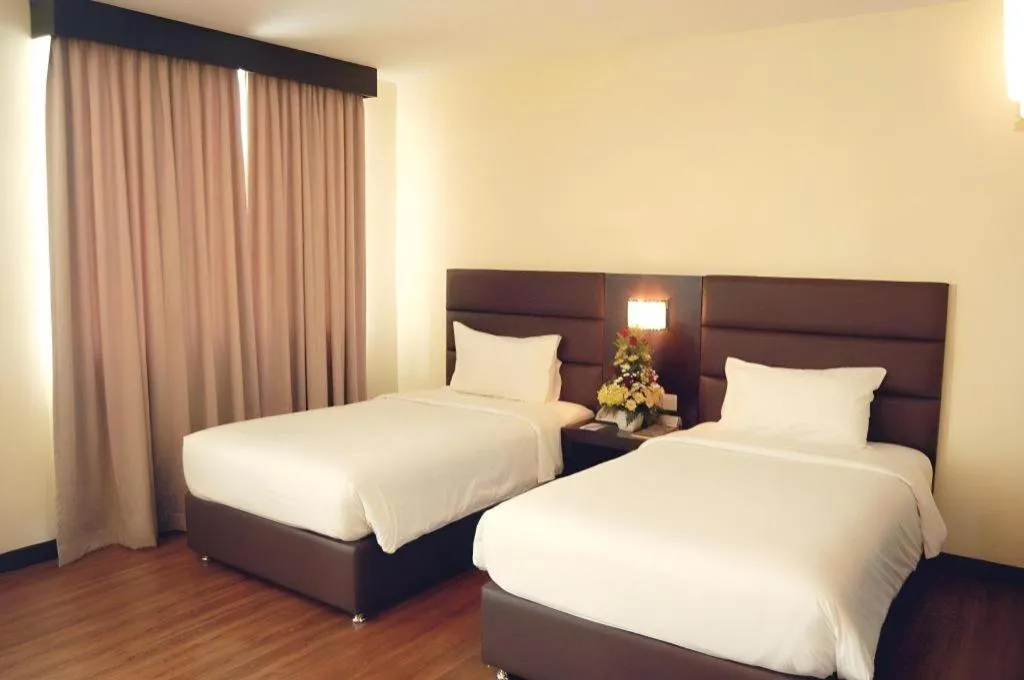 Bed in The BCC Hotel & Residence