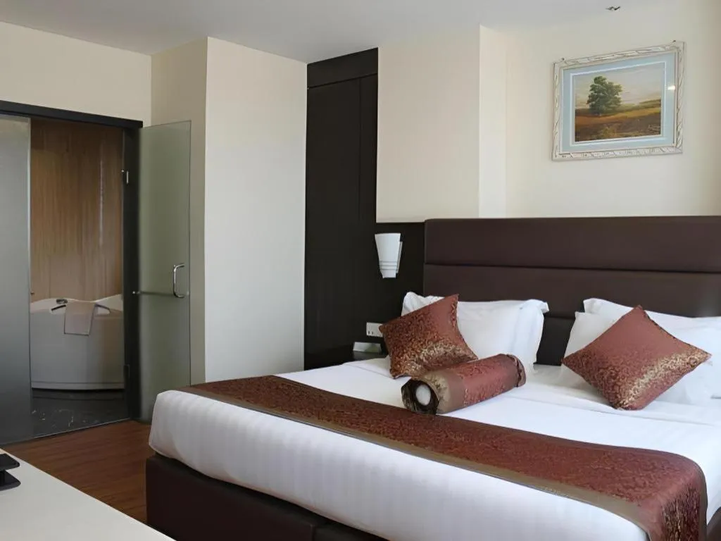 Bed in The BCC Hotel & Residence