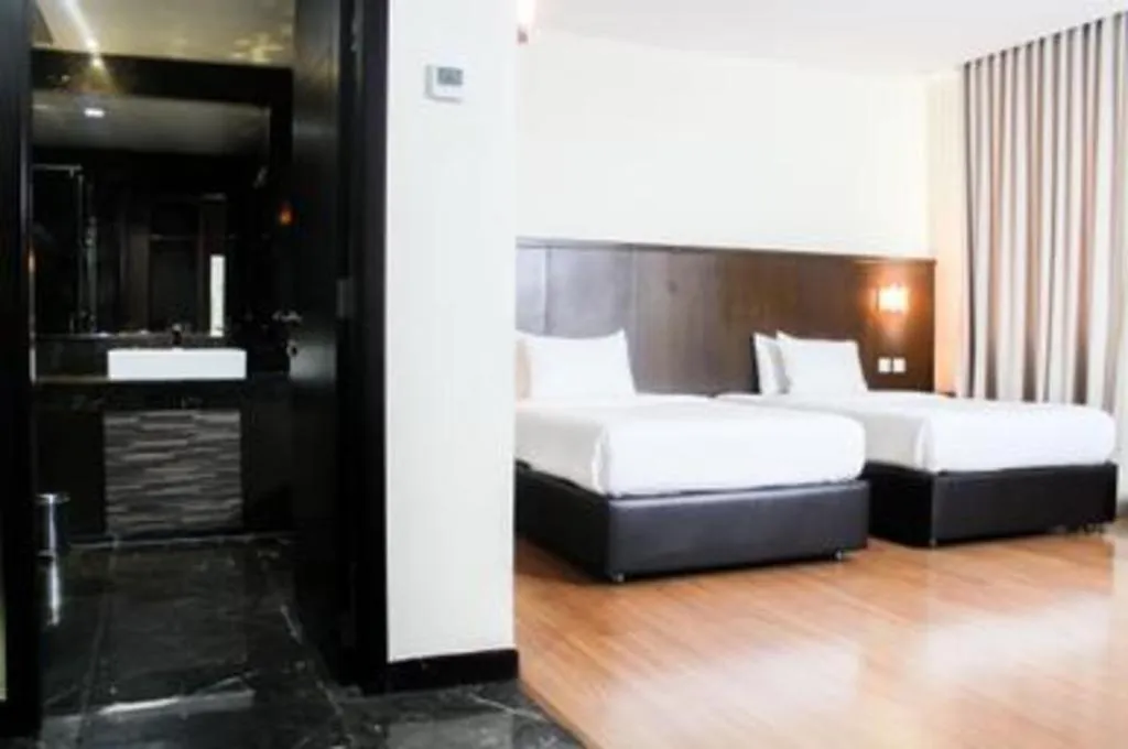 Bed in The BCC Hotel & Residence