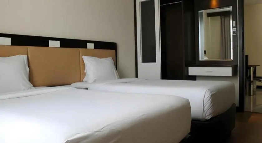 Bed in The BCC Hotel & Residence