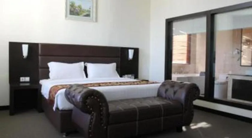 Bed in The BCC Hotel & Residence