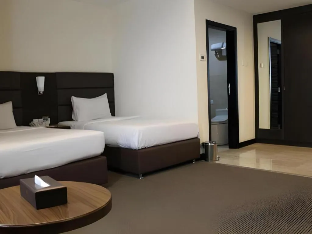 Bed in The BCC Hotel & Residence