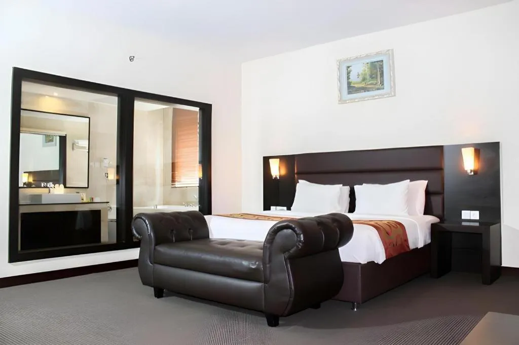 Bed in The BCC Hotel & Residence