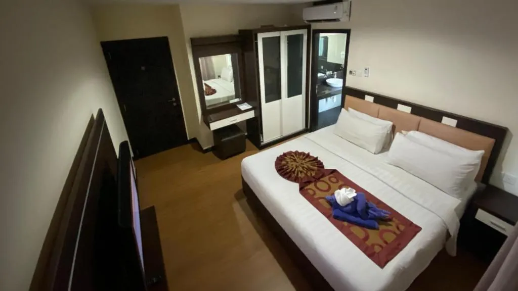 Bed in The BCC Hotel & Residence