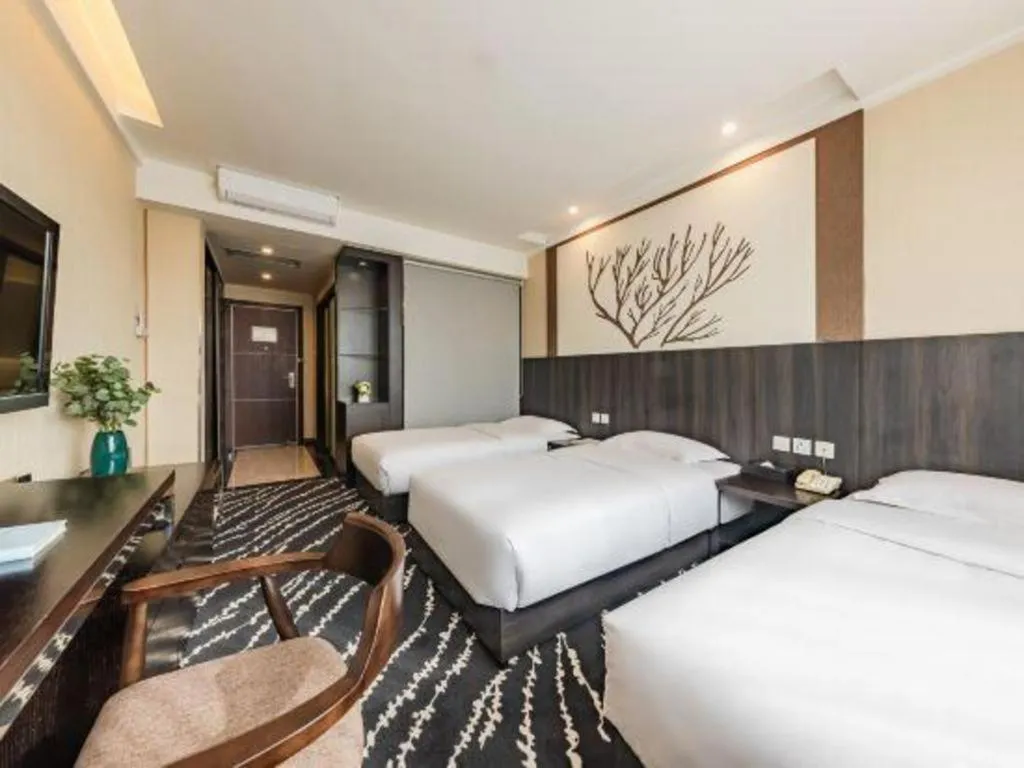 Bed in Kunming Long Way Hotel