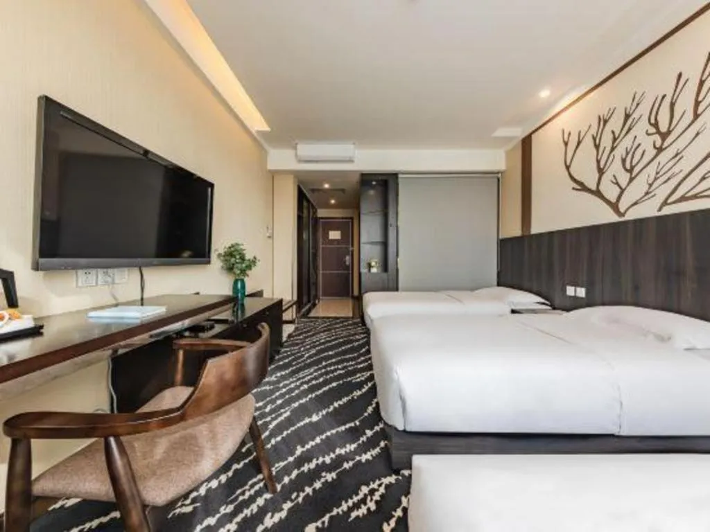 Bed in Kunming Long Way Hotel