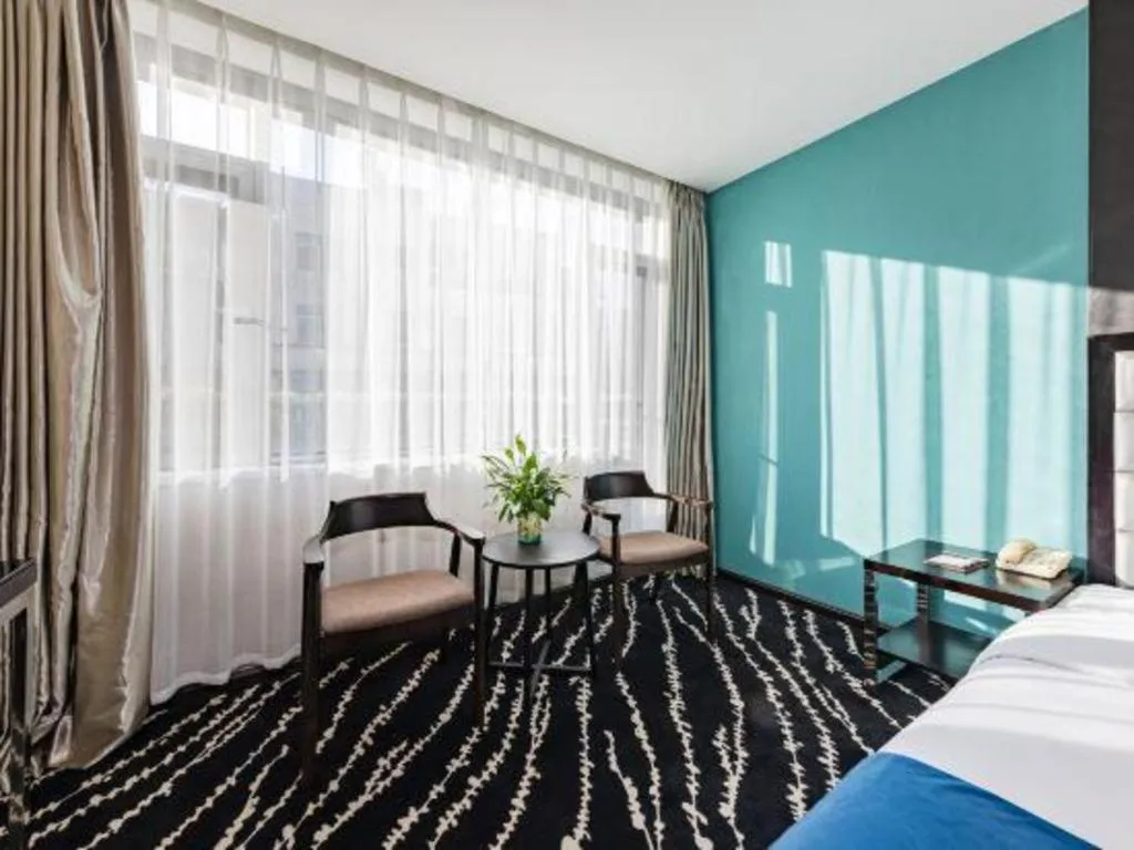 Bed in Kunming Long Way Hotel