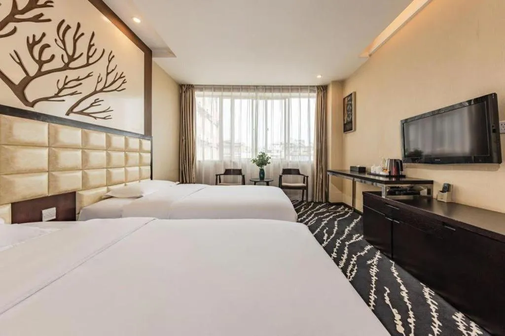 Bed in Kunming Long Way Hotel