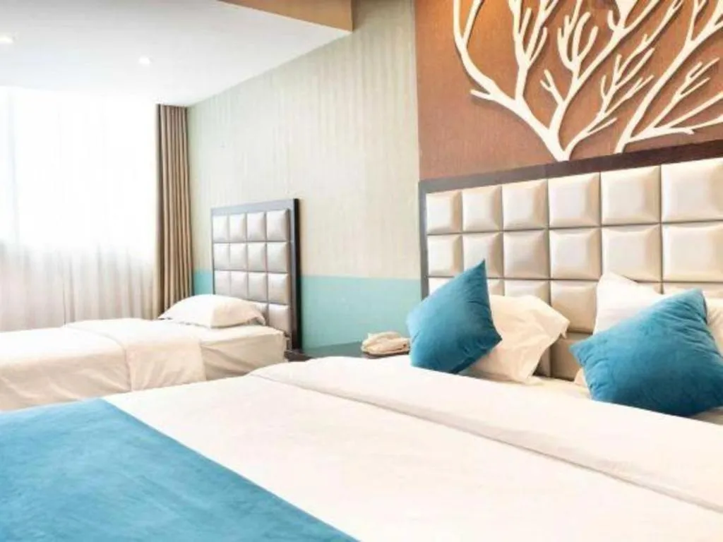 Bed in Kunming Long Way Hotel