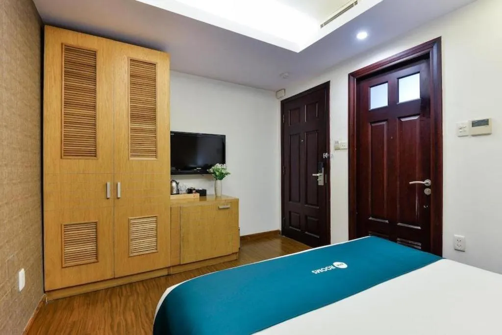 Bed in AHA Boutique Ben Thanh Hotel