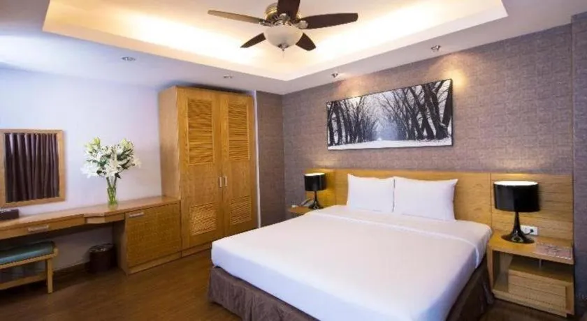Bed in AHA Boutique Ben Thanh Hotel