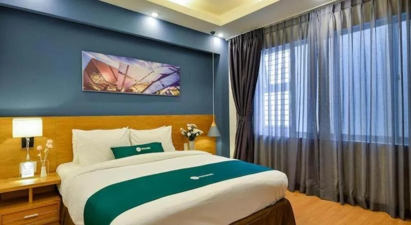 Bed in AHA Boutique Ben Thanh Hotel