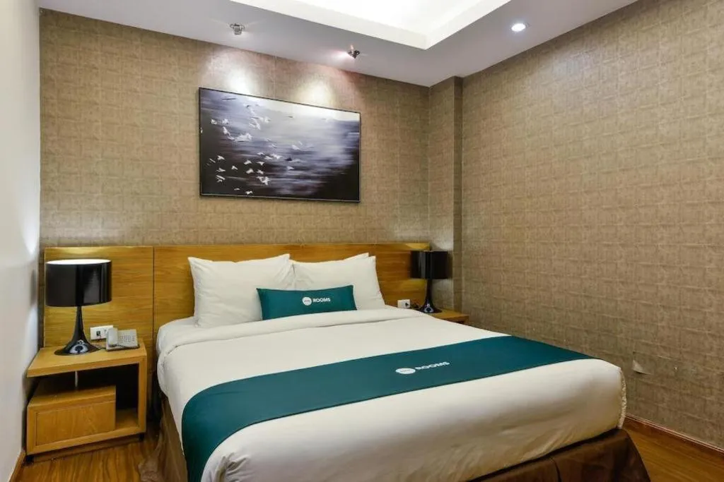 Bed in AHA Boutique Ben Thanh Hotel