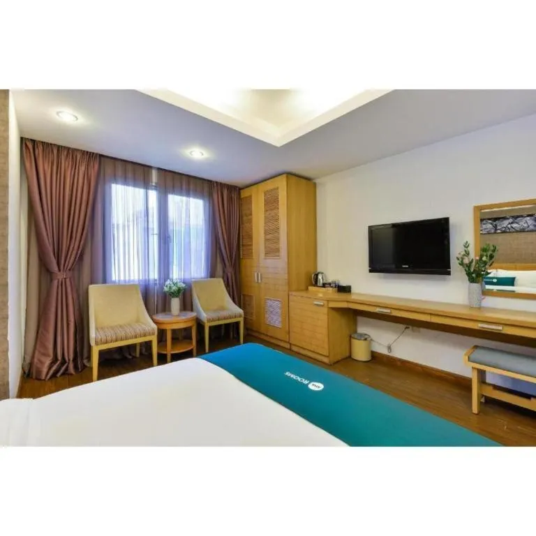 Bed in AHA Boutique Ben Thanh Hotel