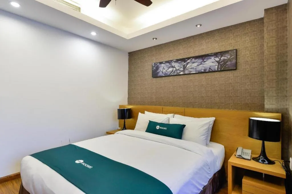 Bed in AHA Boutique Ben Thanh Hotel