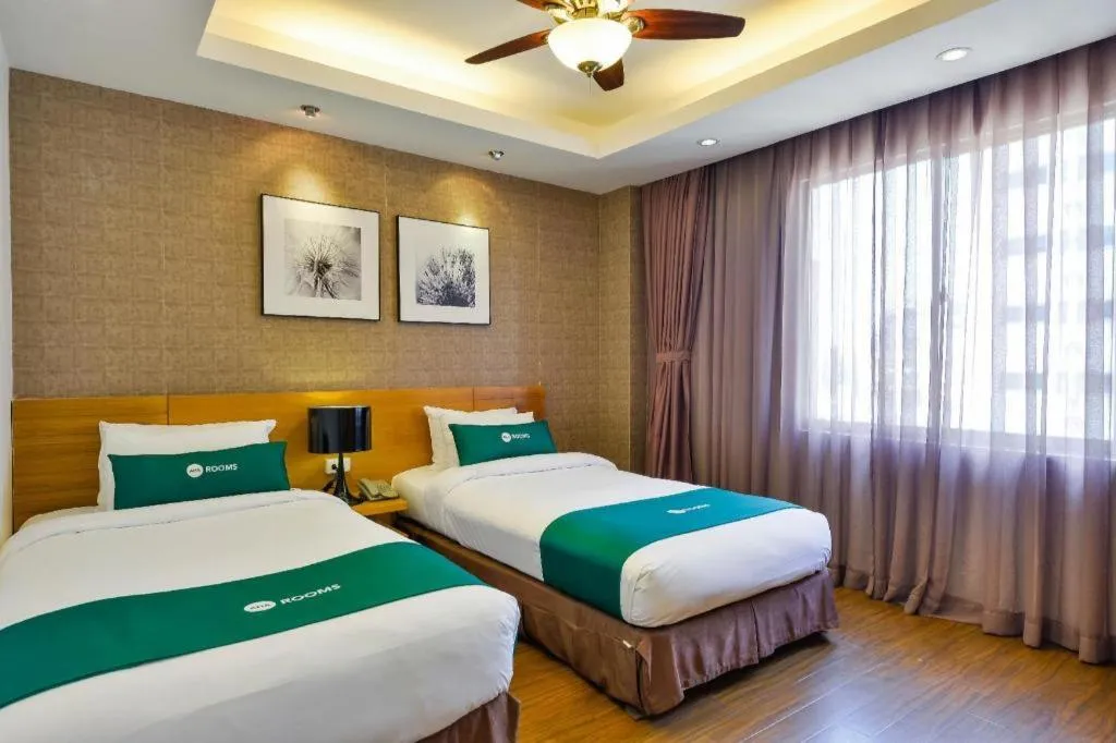 Bed in AHA Boutique Ben Thanh Hotel