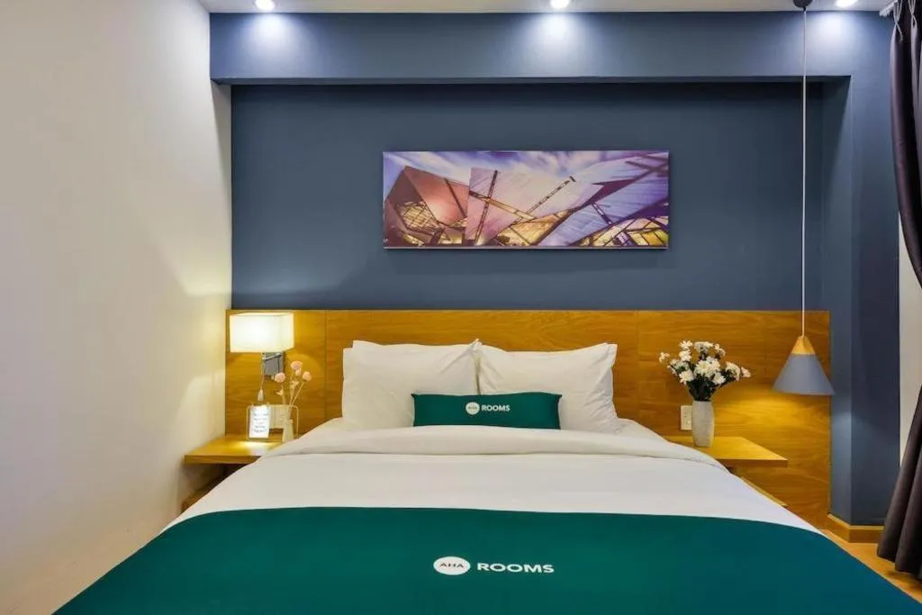 Bed in AHA Boutique Ben Thanh Hotel