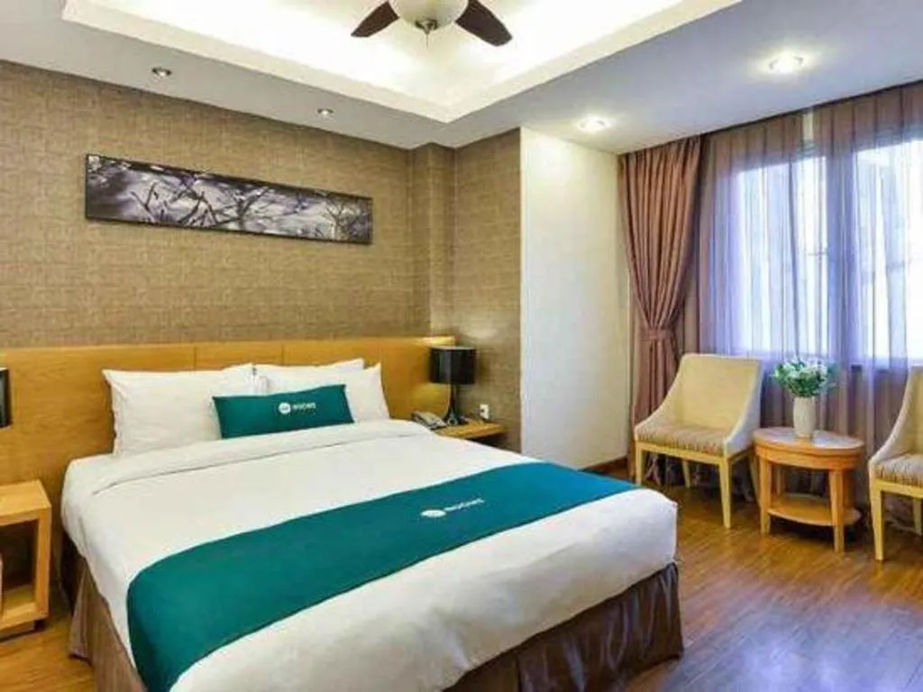 Bed in AHA Boutique Ben Thanh Hotel