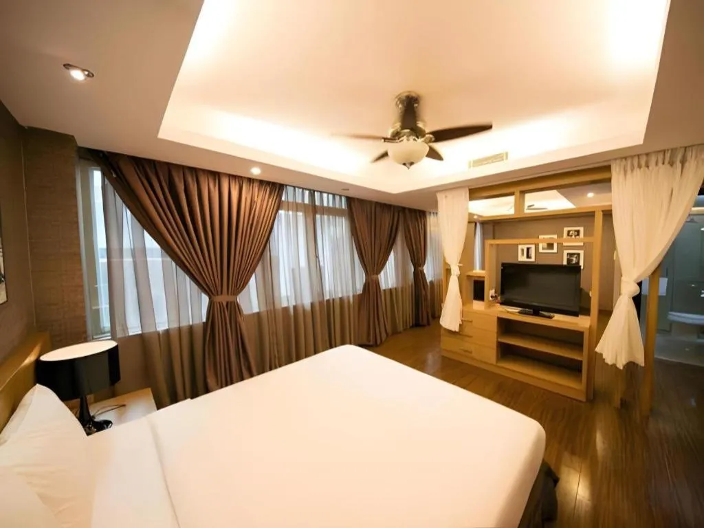 Bed in AHA Boutique Ben Thanh Hotel