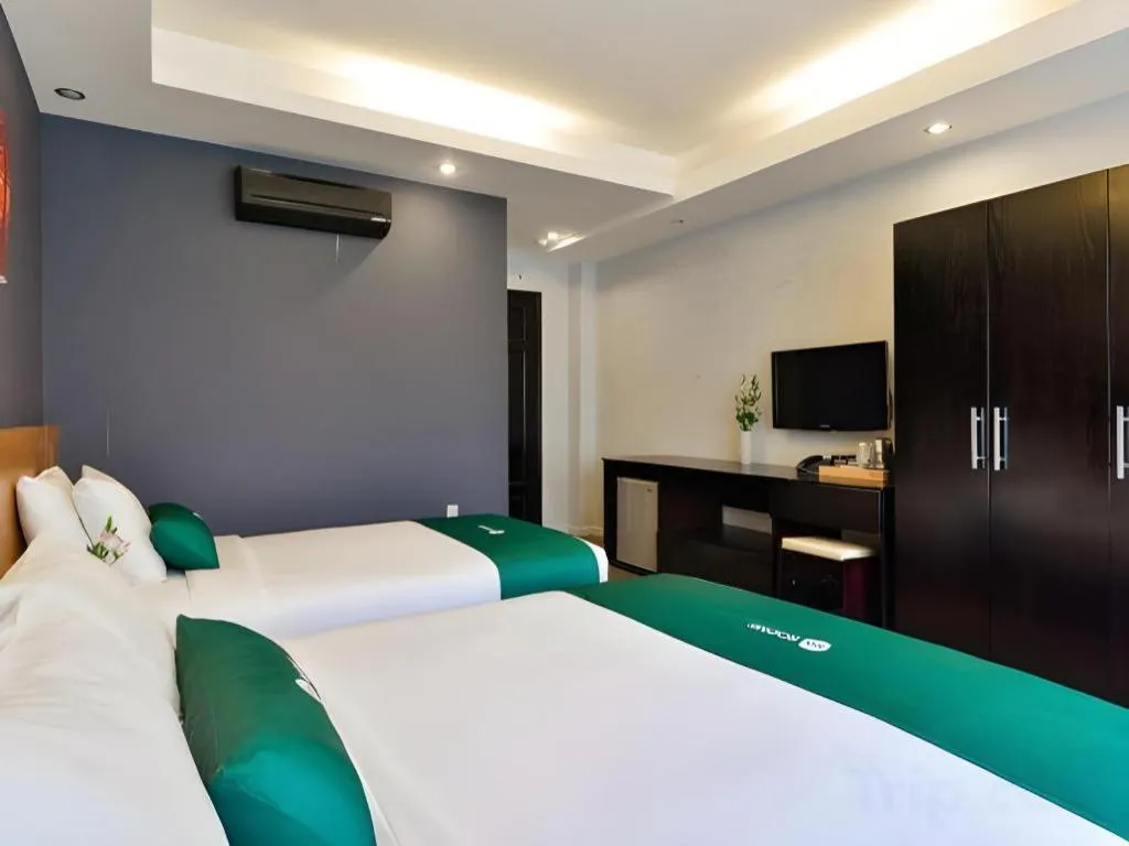 Bed in AHA Boutique Ben Thanh Hotel