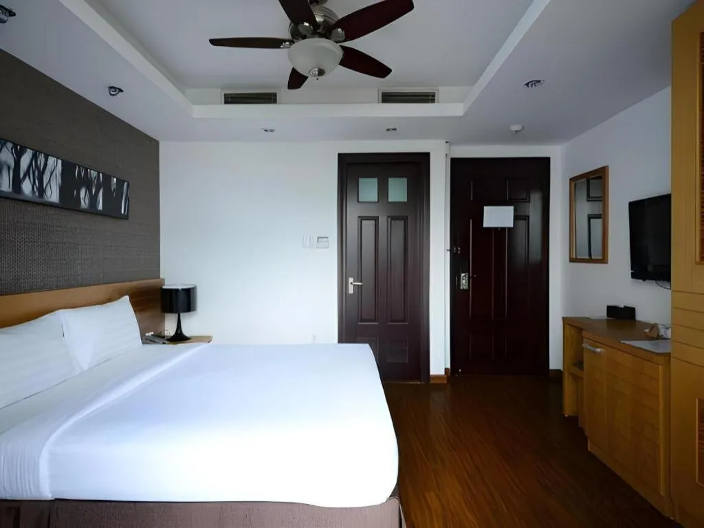 Bed in AHA Boutique Ben Thanh Hotel