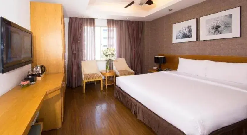 Bed in AHA Boutique Ben Thanh Hotel Bed in AHA Boutique Ben Thanh Hotel