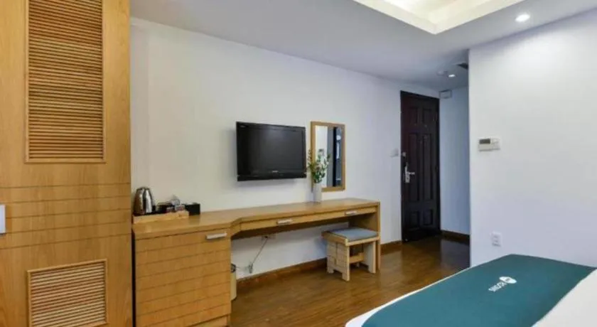 Bed in AHA Boutique Ben Thanh Hotel