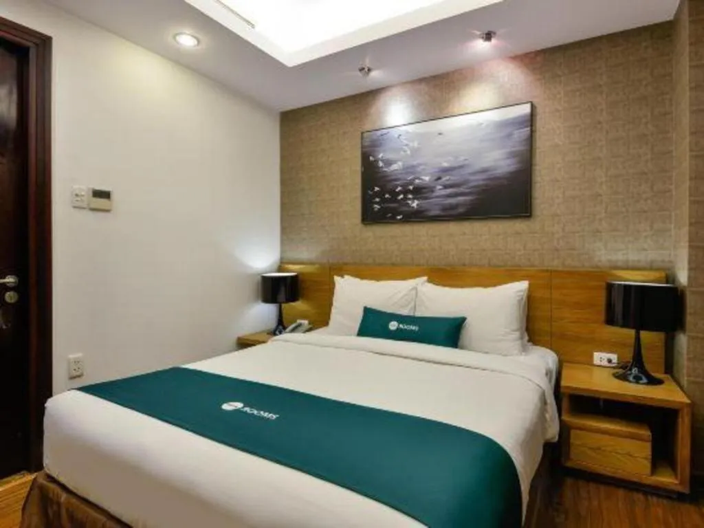 Bed in AHA Boutique Ben Thanh Hotel